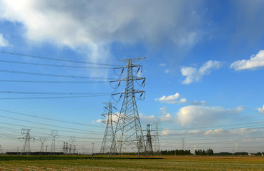 High voltage tower, in the sky background