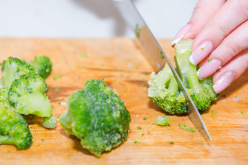 Cut vegetables. Fresh vegetables. Broccoli cabbage. Frozen vegetables. Greens for eating.