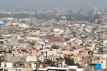 View of the old district of new Delhi. Fog, smog over the city. - obrazy, fototapety, plakaty