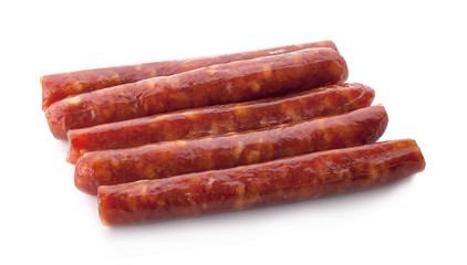Stack of smoked sausages isolated on a white background
