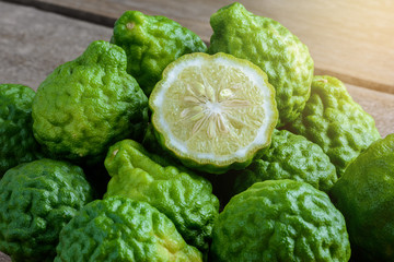 fresh bergamot fruit on wooden table