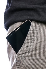 smartphone with a black screen in the pocket of jeans