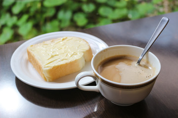 cup of coffee toast with butter