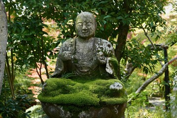 Stone buddha in Kyoto garden
