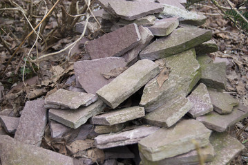A pile of flat natural stones for home decoration.