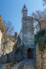 Fototapeta na wymiar Clock tower in the medieval village Vaison-la-Romaine, Provence, France