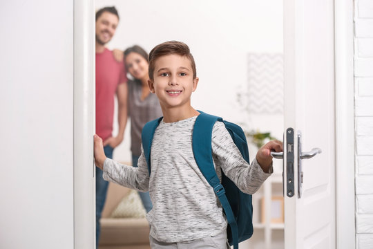 Cute Little Boy With Backpack Leaving For School