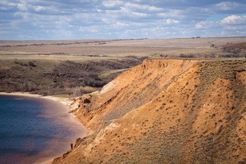 Fototapeta na wymiar steep cliff near the river bank. landscape
