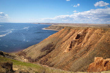 steep cliff near the river bank. landscape