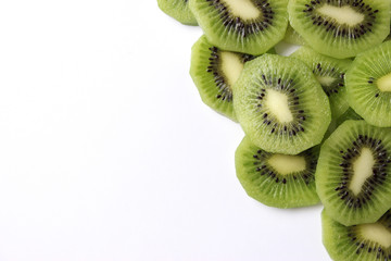  juicy kiwi slices on white background with place for text. vitamins, diet, proper nutrition 