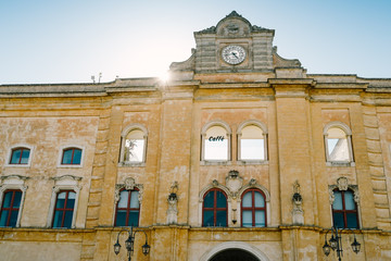 Fototapeta na wymiar Matera, Italy - Annunziata Palace, seat of the provincial library Stigliani. Vittorio Veneto square.