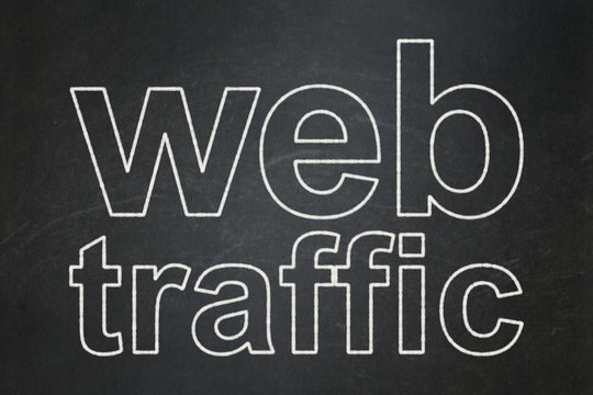 Web development concept: text Web Traffic on Black chalkboard background