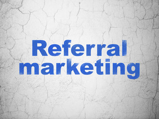 Advertising concept: Blue Referral Marketing on textured concrete wall background