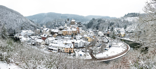 Panoramic view of snow covered Esch sur sure town in Luxembourg