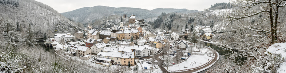Fototapeta na wymiar Panoramic view of snow covered Esch sur sure town in Luxembourg