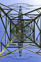 electric pylon under blue sky