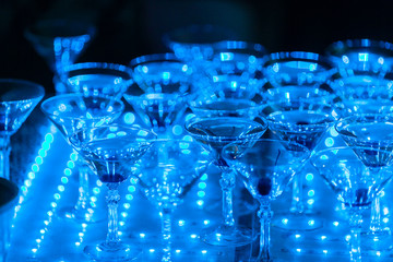 Champagne glass pyramid on wedding party. Tower of glasses of wine