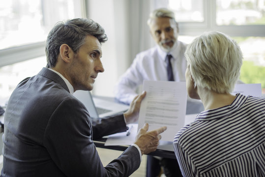 Businessman meeting with couple