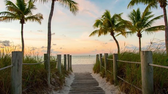 Footbridge to the Smathers beach on sunrise - Key West, Florida. Raw video source.