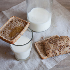 Simple meal. Healthy food. Healthy diet. Black bread and milk