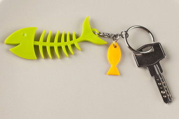 Housewarming. Keys  with a keychain in the form of a fish