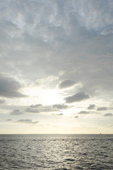 cloudy blue sky and soft sunset on the ocean in the nice day