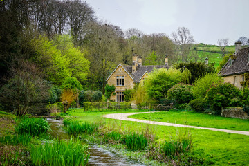 Picturesque Stone Cottae with The River Eye  in The Village of Upper Slaughter