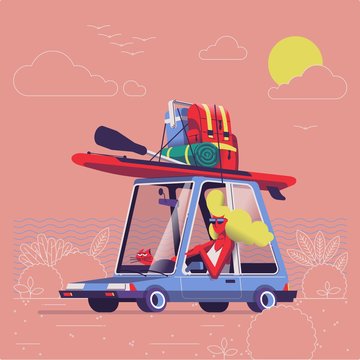 girl driving car with surf equipment on top