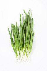 green onion on a white background. spring natural vitamins