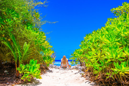 Blond woman with bikini at the  sea on Maldives