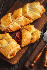 Puff pastry bread with salami and mozzarella.