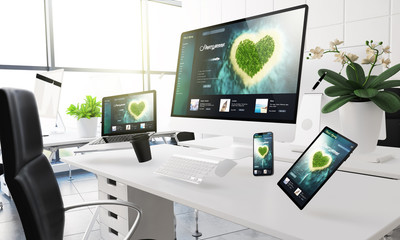 devices floating on mid air mockup showing honeymoon travel website