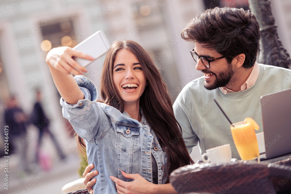 Canvas Prints couple having great time in cafe together