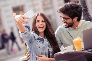 Couple having great time in cafe together