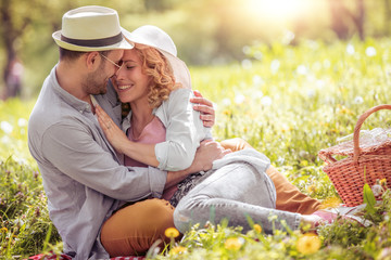 Beautiful happy couple on romantic picnic