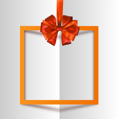Orange square frame with bow on white.