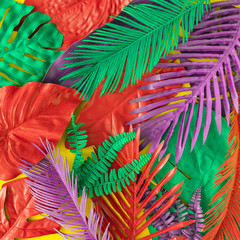 Painted tropical and palm leaves in vibrant bold colors. Concept art. Minimal summer colorful...
