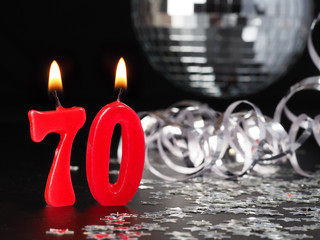 Red candles showing Nr. 70

Abstract Background for birthday or anniversary party.