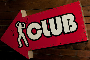 funky red disco club sign in retro style