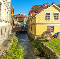 Fototapeta na wymiar Brook in old city of Kuldiga, Latvia, Europe