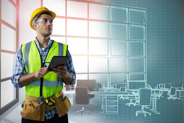 Composite image of concentrated construction worker with tablet