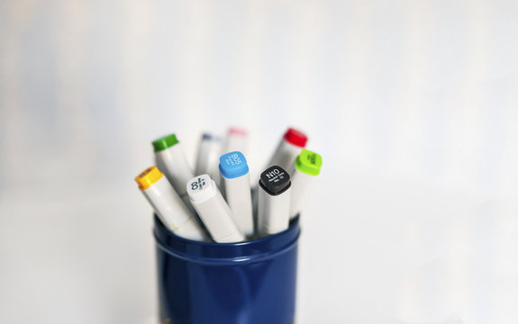 Isolated Color Sharpie Markers (pens) In A Blue Can With White Background