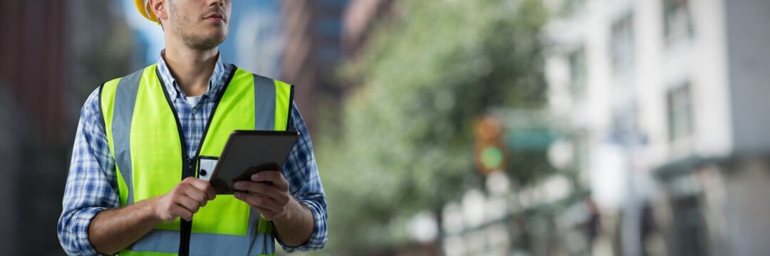 Composite Image Of Concentrated Construction Worker With Tablet