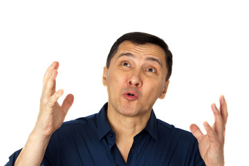 The young man asks about something hands raised to the sky. Concept emotion, please, plea