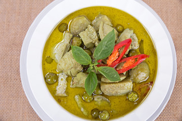 Close up top view green curry with chicken, Thai local food