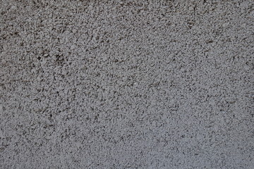 Texture of grainy grey wall (front view)