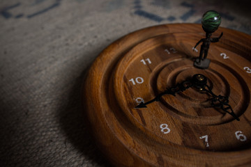 Clock with a funny art on the top