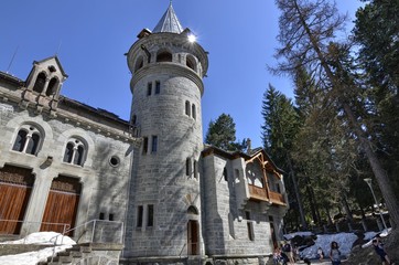 Gressoney-Saint-Jean, Valle d'Aosta region, Italy. 25 April 2018. Castel Savoia, is a villa built in the late 1800s in eclectic style. In a fairytale context, photos of the exterior. Sunny day.