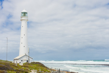 Cape Town Lighthouse on a rugged coastline during the daytime