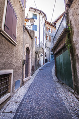 Fototapeta na wymiar Italian alley near Garda Lake